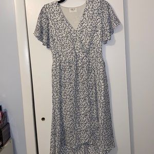 White flowery knee length dress